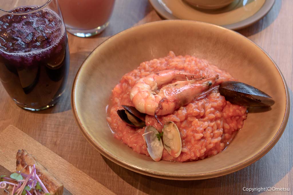 PISOLA福生店の「魚介たっぷりのペスカトーレトマトリゾット」