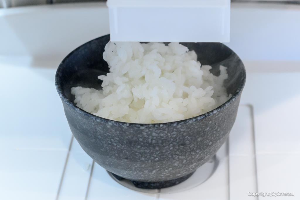 感動の肉と米 武蔵村山店の、ご飯盛り付け機